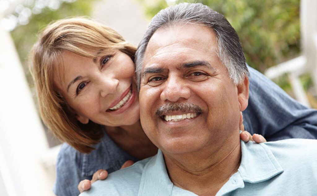 older latino couple smiling