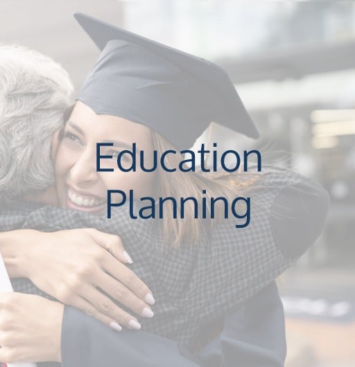 Education Planning - women in a graduation cap and gown receiving a hug from her mom