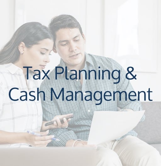 Tax Planning - young couple looking at documents together